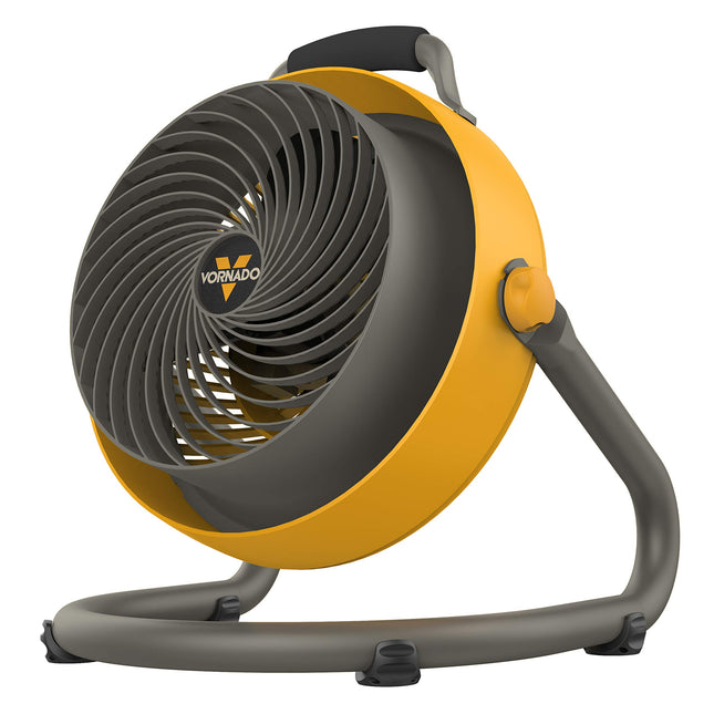 Yellow and gray Vornado fan on a white background