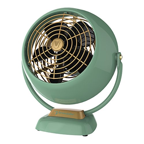 Vintage-style green fan with gold accents on a white background