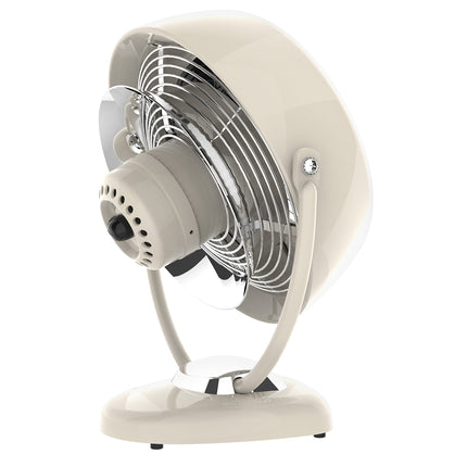 Vintage-style beige table fan on a white background