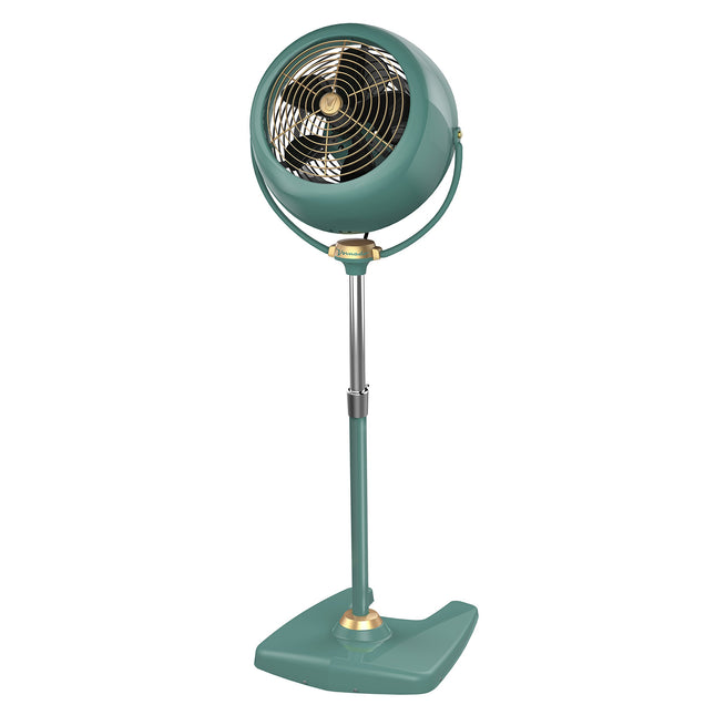 Vintage-style teal pedestal fan on a white background