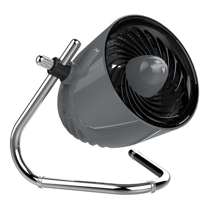 Gray and black fan with a chrome stand on a white background