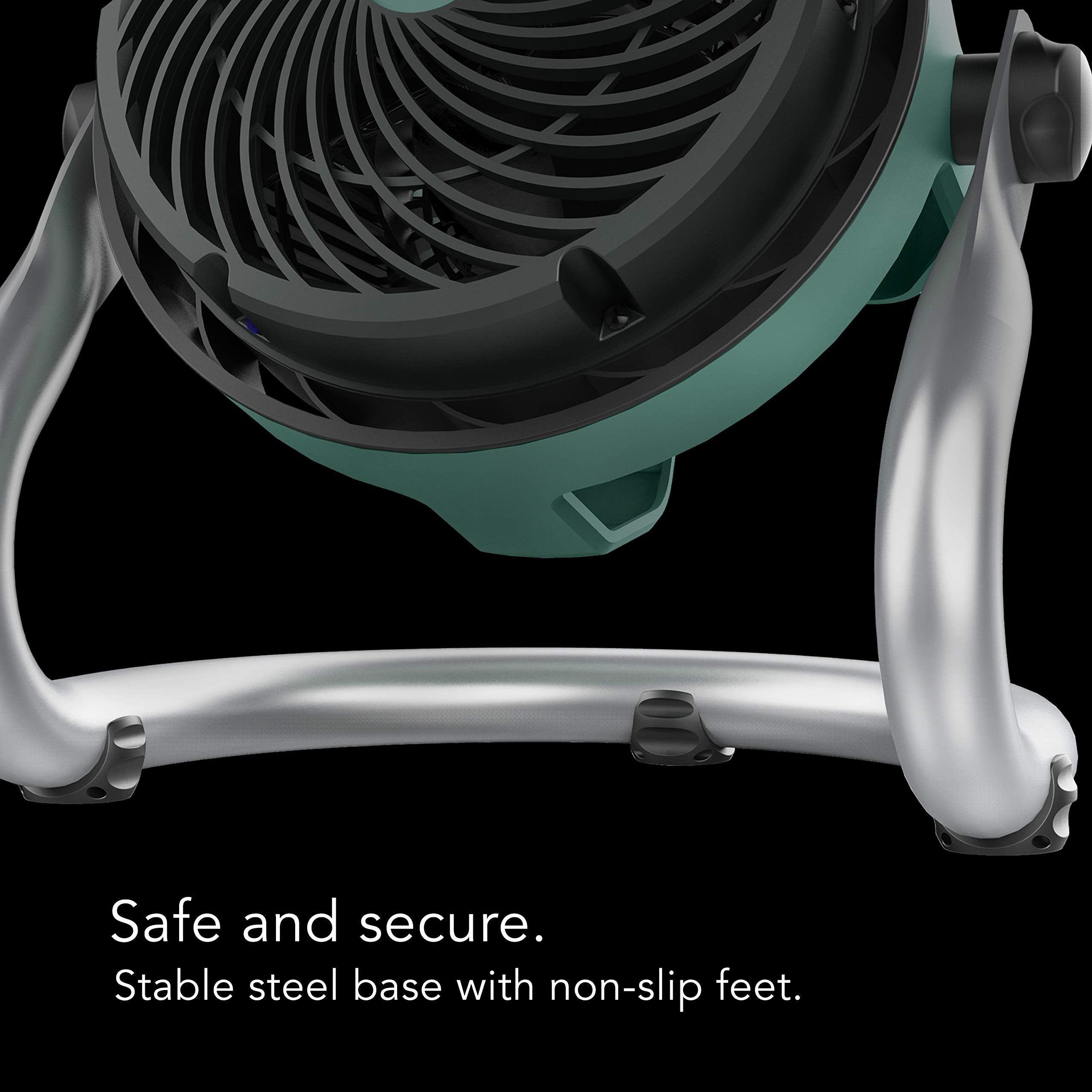 Portable fan with stable steel base on a black background