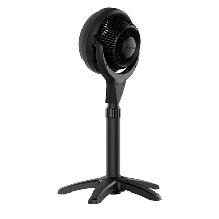 Black pedestal fan on a white background