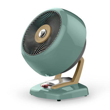 Teal and gold heater on a white background