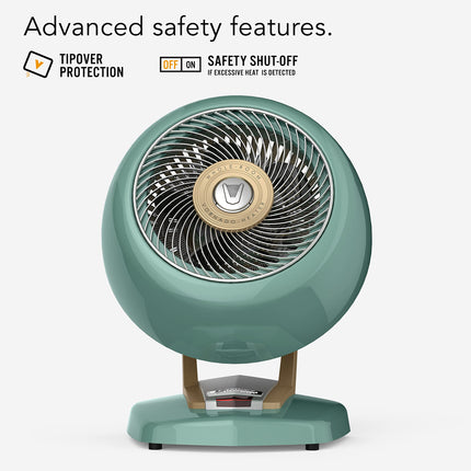 Green heater with safety features on a white background
