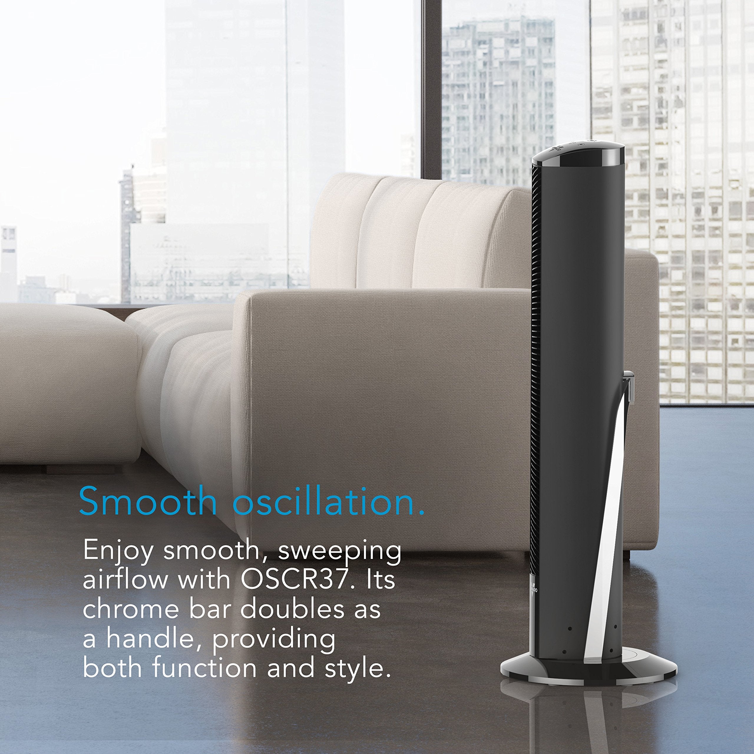 Tall black tower fan in a modern room with a cityscape view