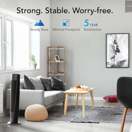 Living room with a sofa, table, and standing device, featuring text about product attributes.