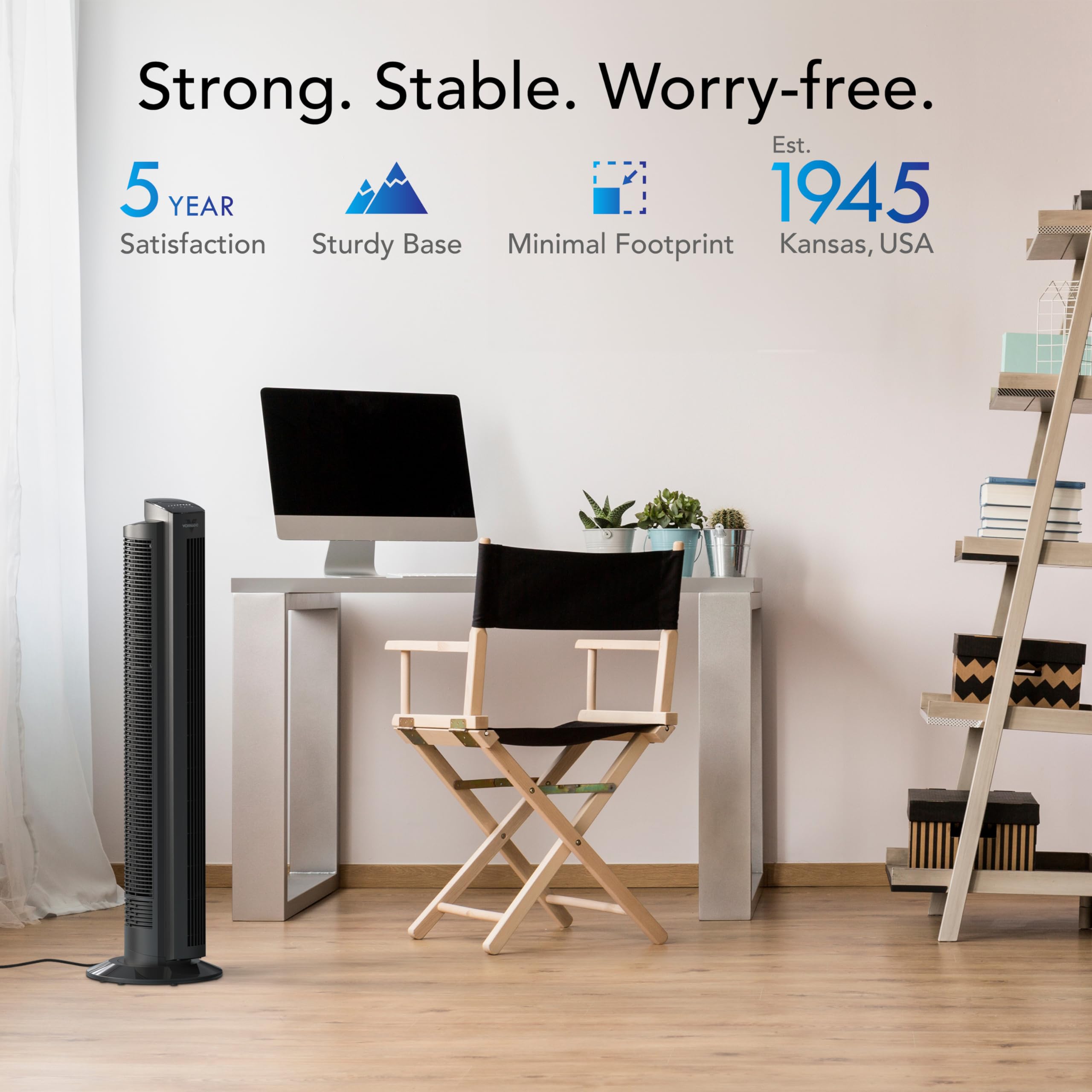 Home office setup with a computer desk, chair, and tower fan, featuring text about product attributes.