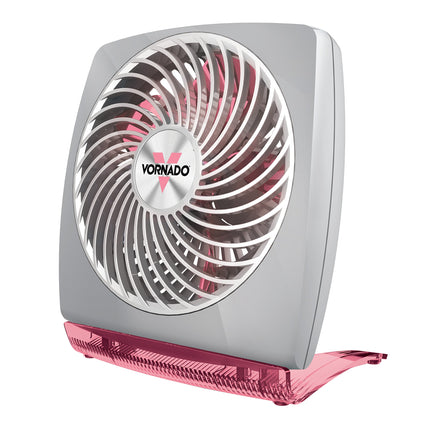Portable fan with pink base and gray top on a white background