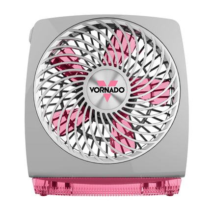 Pink and gray Vornado fan on a white background