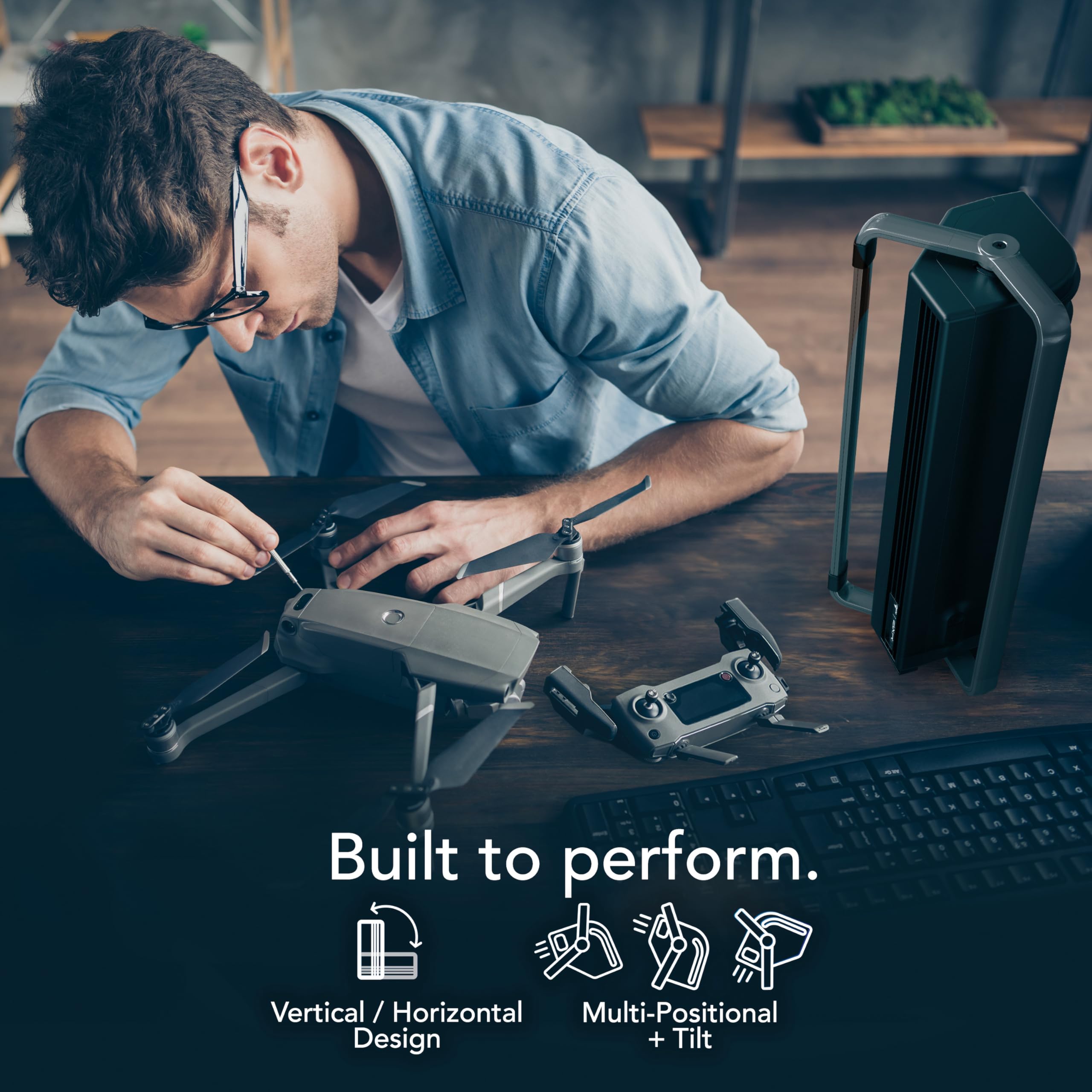 Person assembling a drone with text 'Built to perform' and icons below.