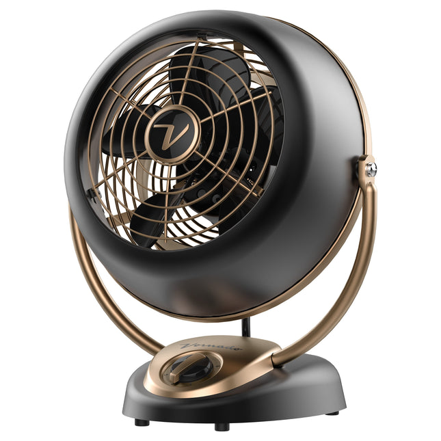 Vintage-style desk fan with black and bronze design on a white background