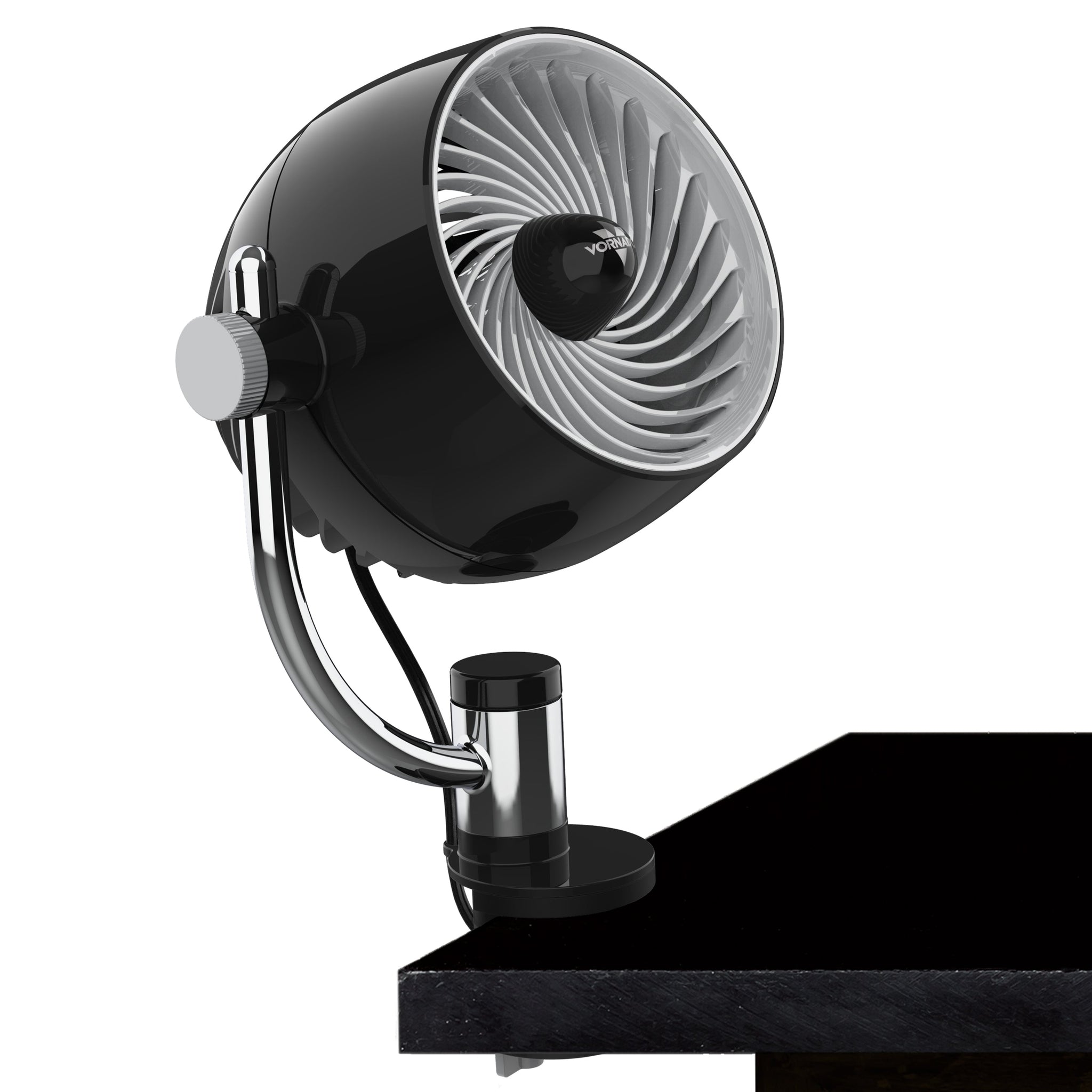 A vornado fan with a clip attached to a desk on a white background
