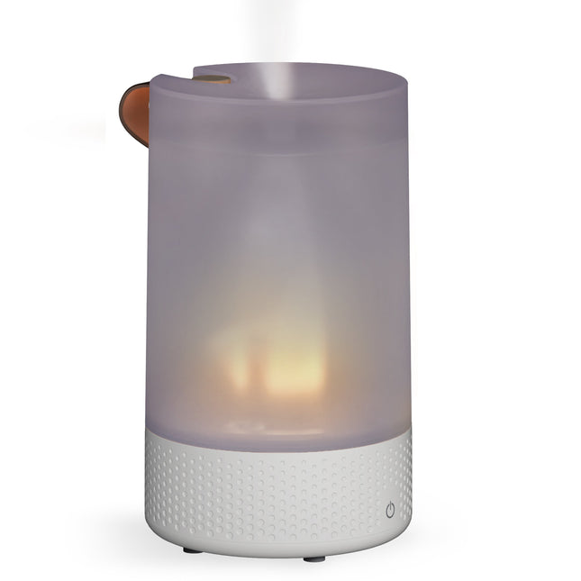 Cylindrical diffuser with a white base and purple top on a white background