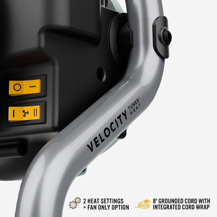 Close-up of a Velocity-branded heating device with control buttons on a white background