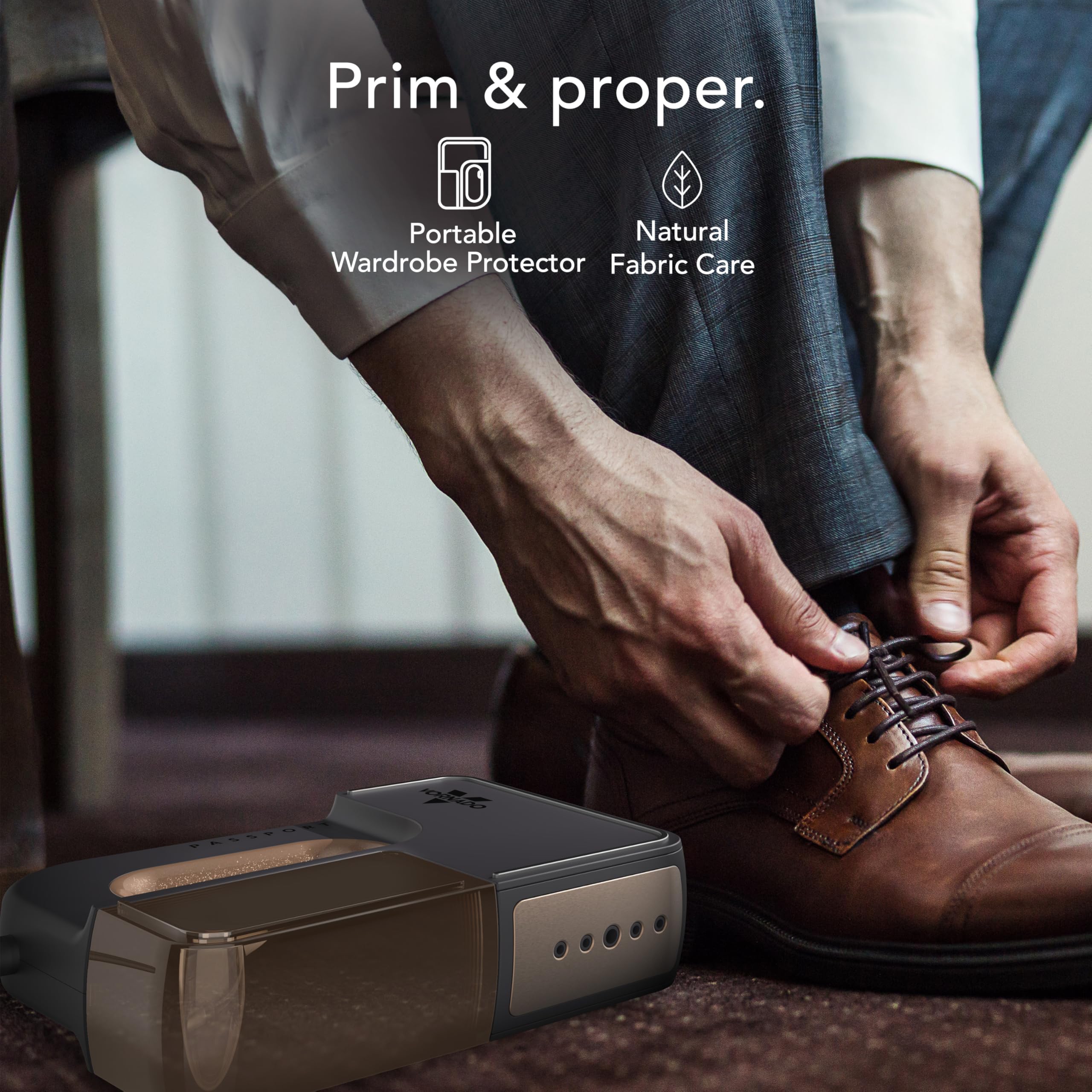 Person tying a shoe with a portable wardrobe protector device on a carpeted floor.