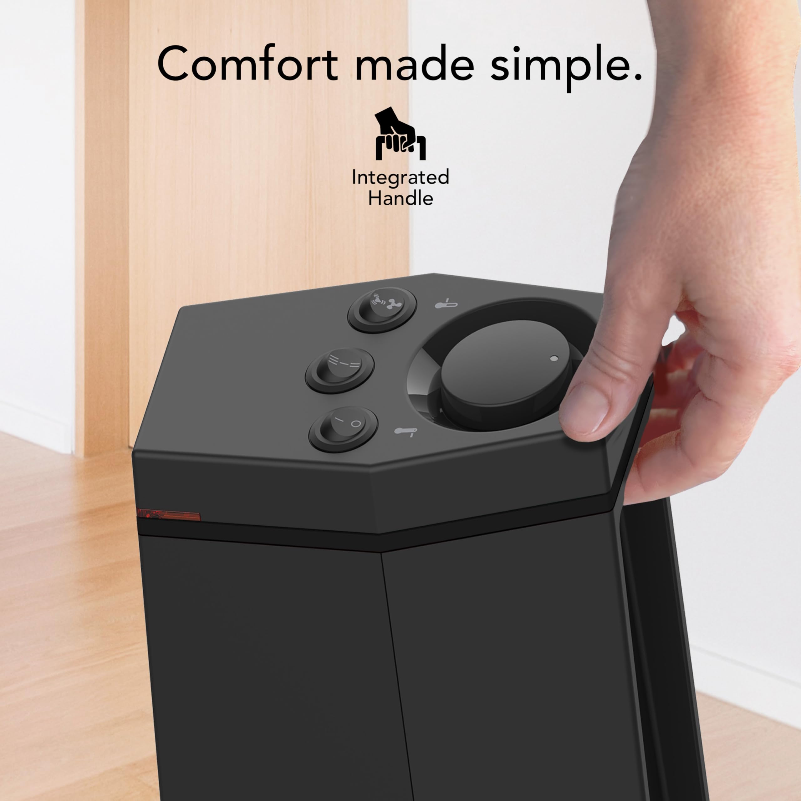 Black space heater with a hand holding it, featuring the text 'Comfort made simple.'