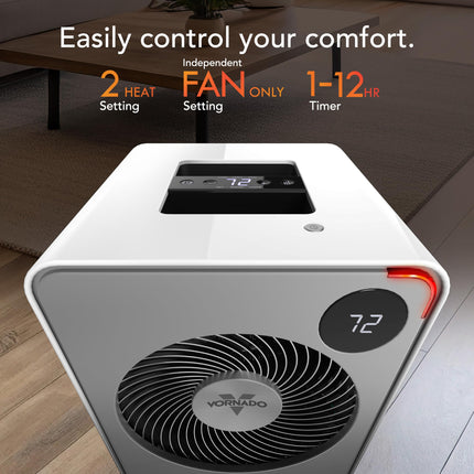White and gray space heater with digital display on a wooden floor.