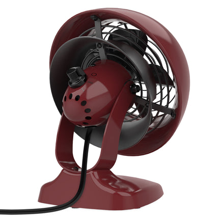 Red vintage-style fan on a white background