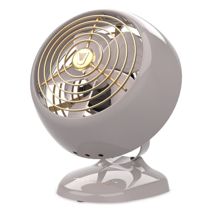 Gray and gold fan on a white background