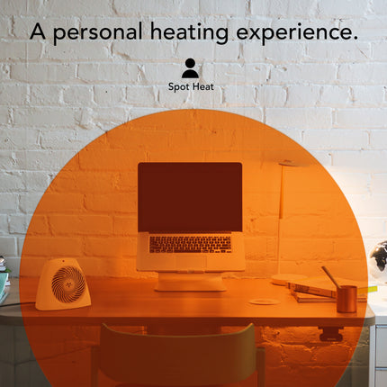 Laptop on a desk with a circular orange glow, branded 'Spot Heat'.