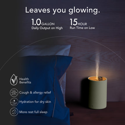 Humidifier emitting mist in a bedroom setting with text highlighting features and benefits.