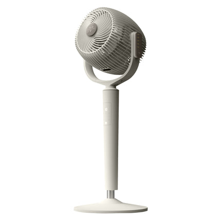 White oscillating pedestal fan on a white background