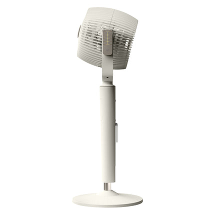 White oscillating pedestal fan on a white background