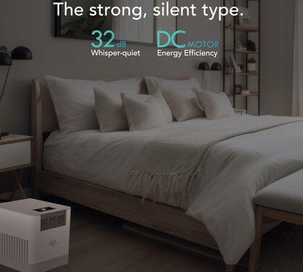 Bedroom with a white humidifier, bed, and nightstands.