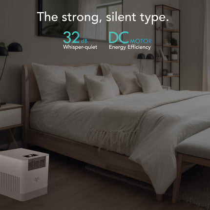 Bedroom with a white humidifier, bed, and nightstands.