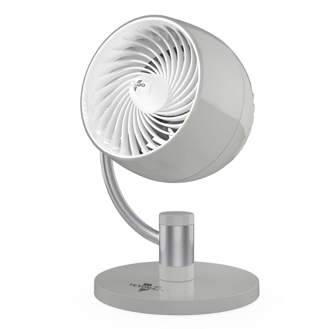 White and gray pivoting desk fan on a white background