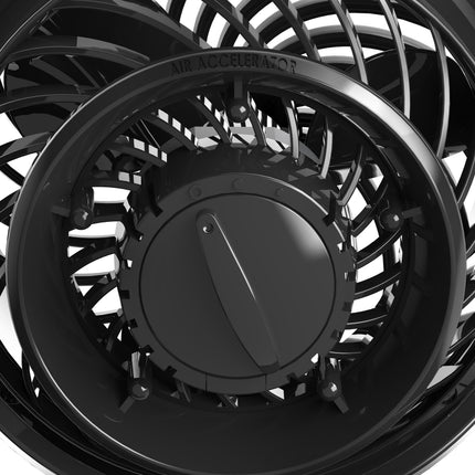 Close-up of a black air accelerator wheel on a white background
