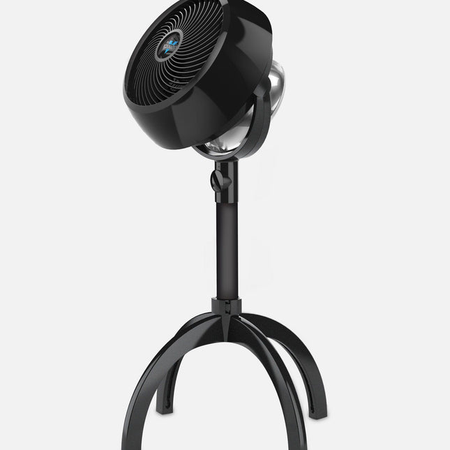 Black floor fan on a white background