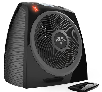 Black Vornado heater with remote control on a white background