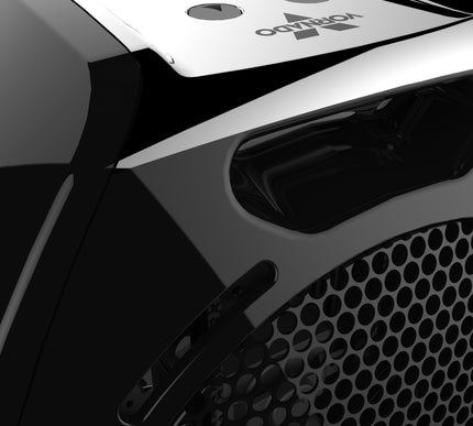 Close-up of a black electronic device with visible branding on a dark background