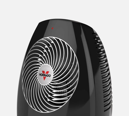 Black Vornado space heater on a white background