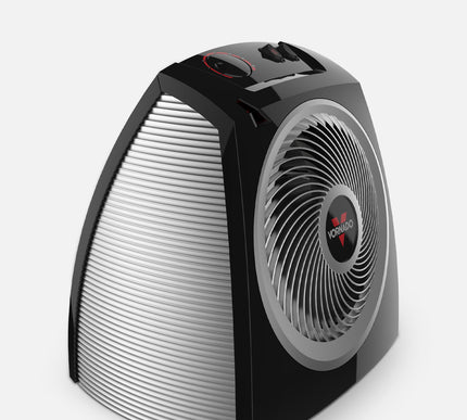 Black and silver space heater on a white background