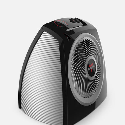 Black and silver space heater on a white background