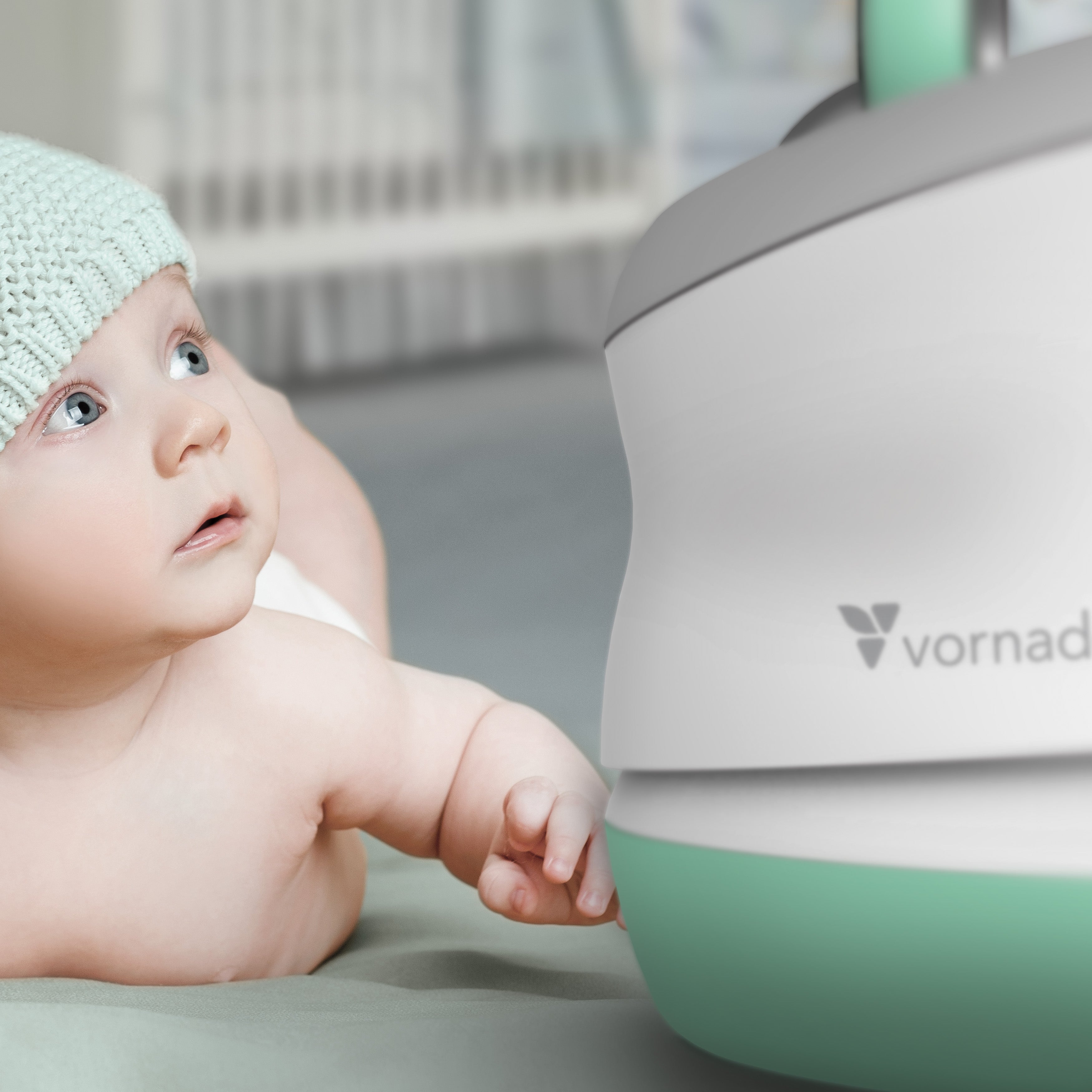 Baby interacting with a Vornadobaby humidifier