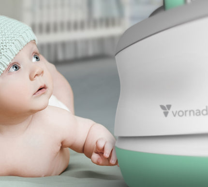Baby interacting with a Vornadobaby humidifier