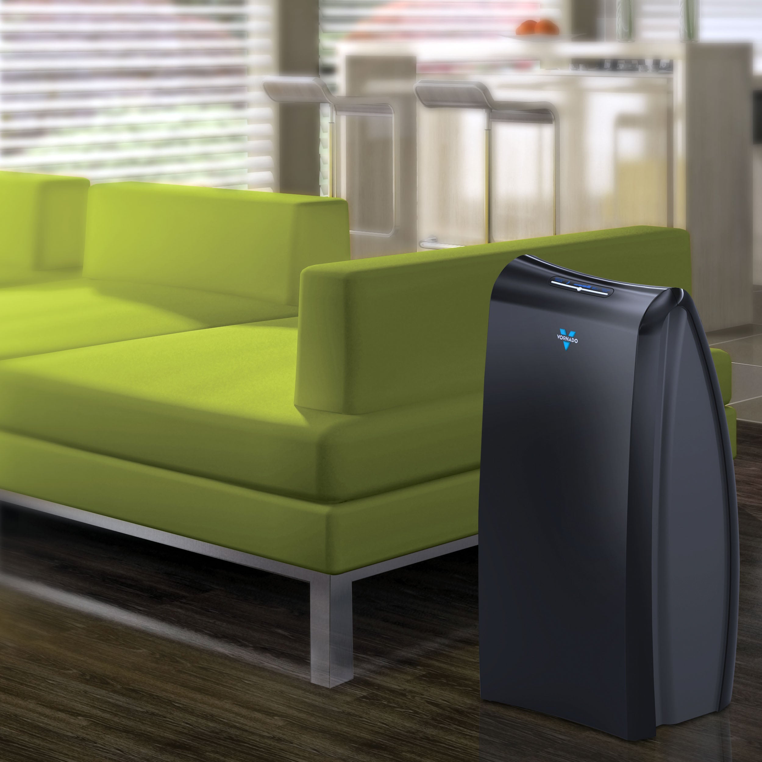 Air purifier next to a green sofa in a living room setting