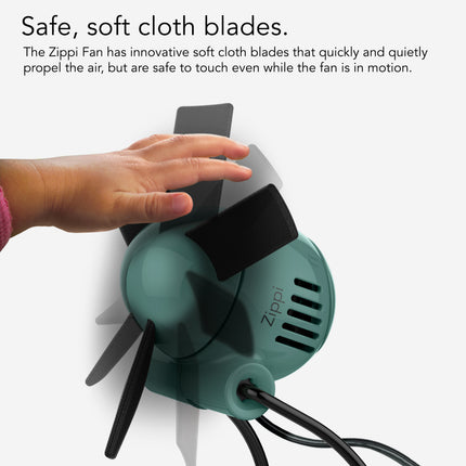 Zippi Fan with soft cloth blades and a hand touching it, on a white background.
