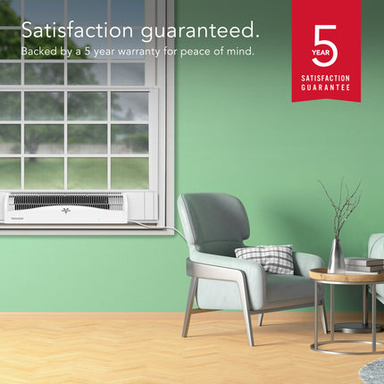 Modern room with window fan, chair, and 5-year satisfaction guarantee badge.