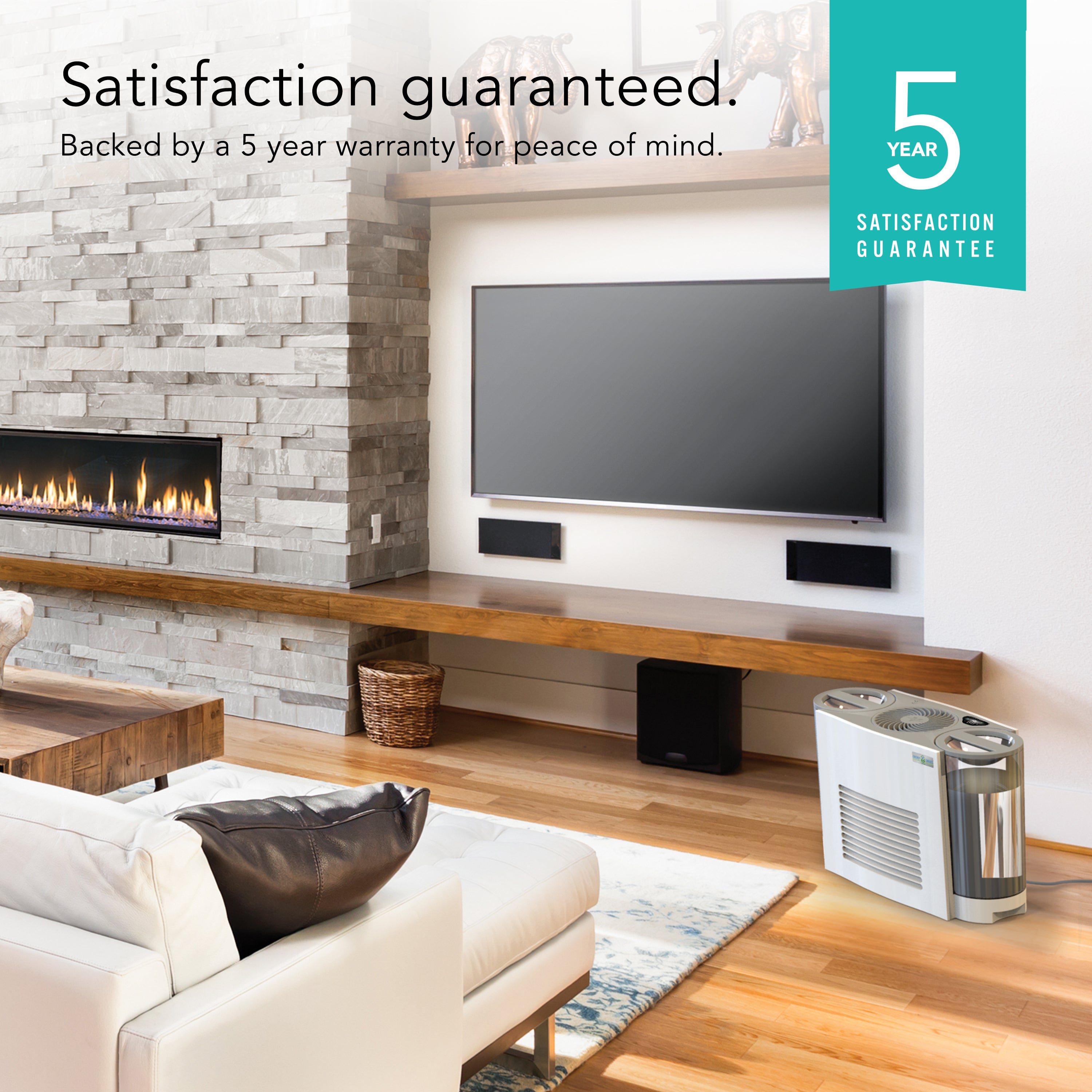 Living room with a TV, fireplace, and air purifier, featuring a 5-year satisfaction guarantee.