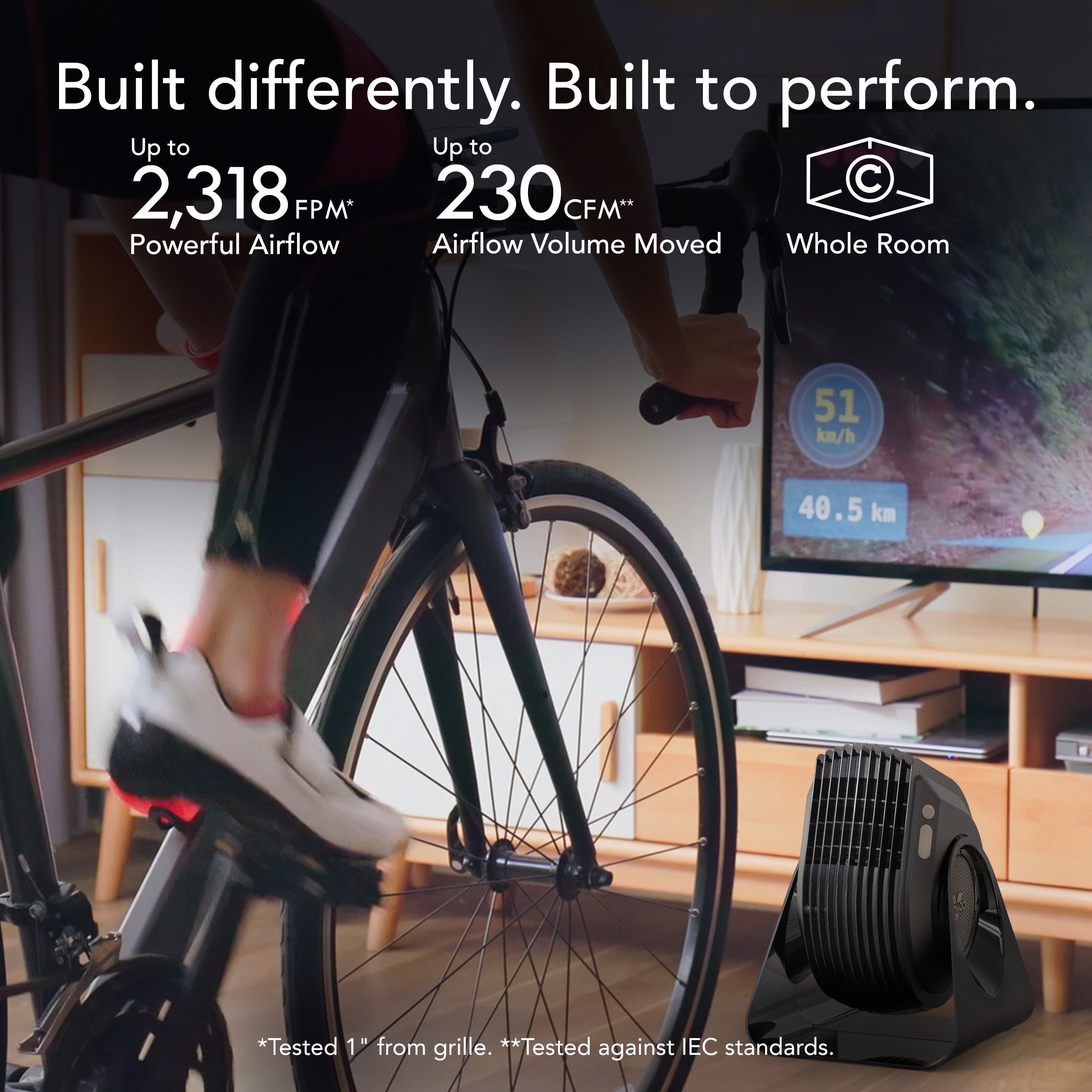 Person using a stationary bike with a fan in a room, featuring text about airflow performance.