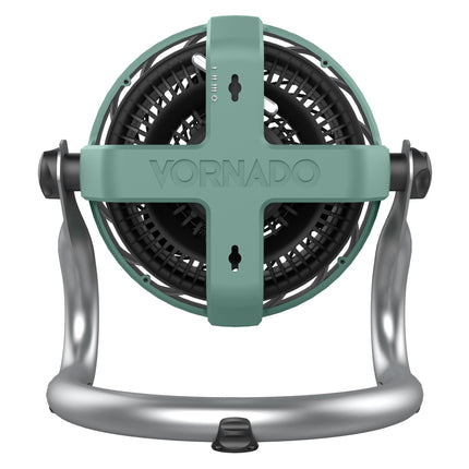 Vornado fan with green and silver design on a white background