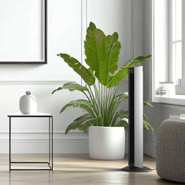 Potted plant in a modern living room with a side table and lamp.