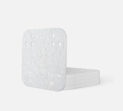 White Mineral absorption pads with textured surface on a white background