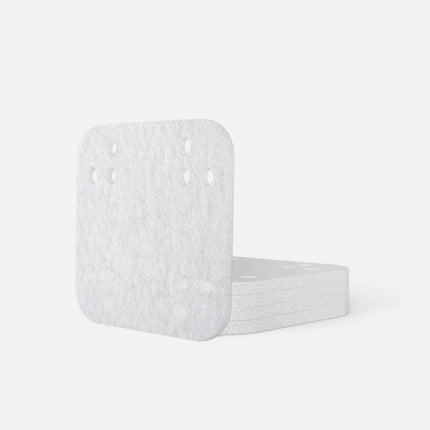 White Mineral absorption pads with textured surface on a white background