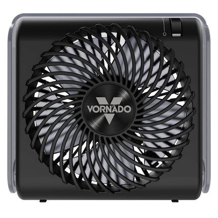 A Vornado portable fan with a black front grille and silver inner blades, shown against a plain white background.